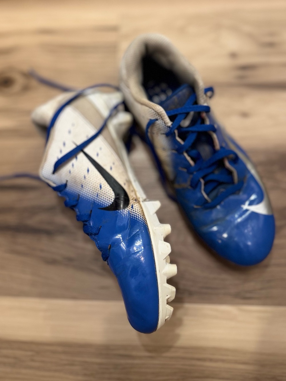 Nike Blue, White, and Black Kids football Cleats size 6